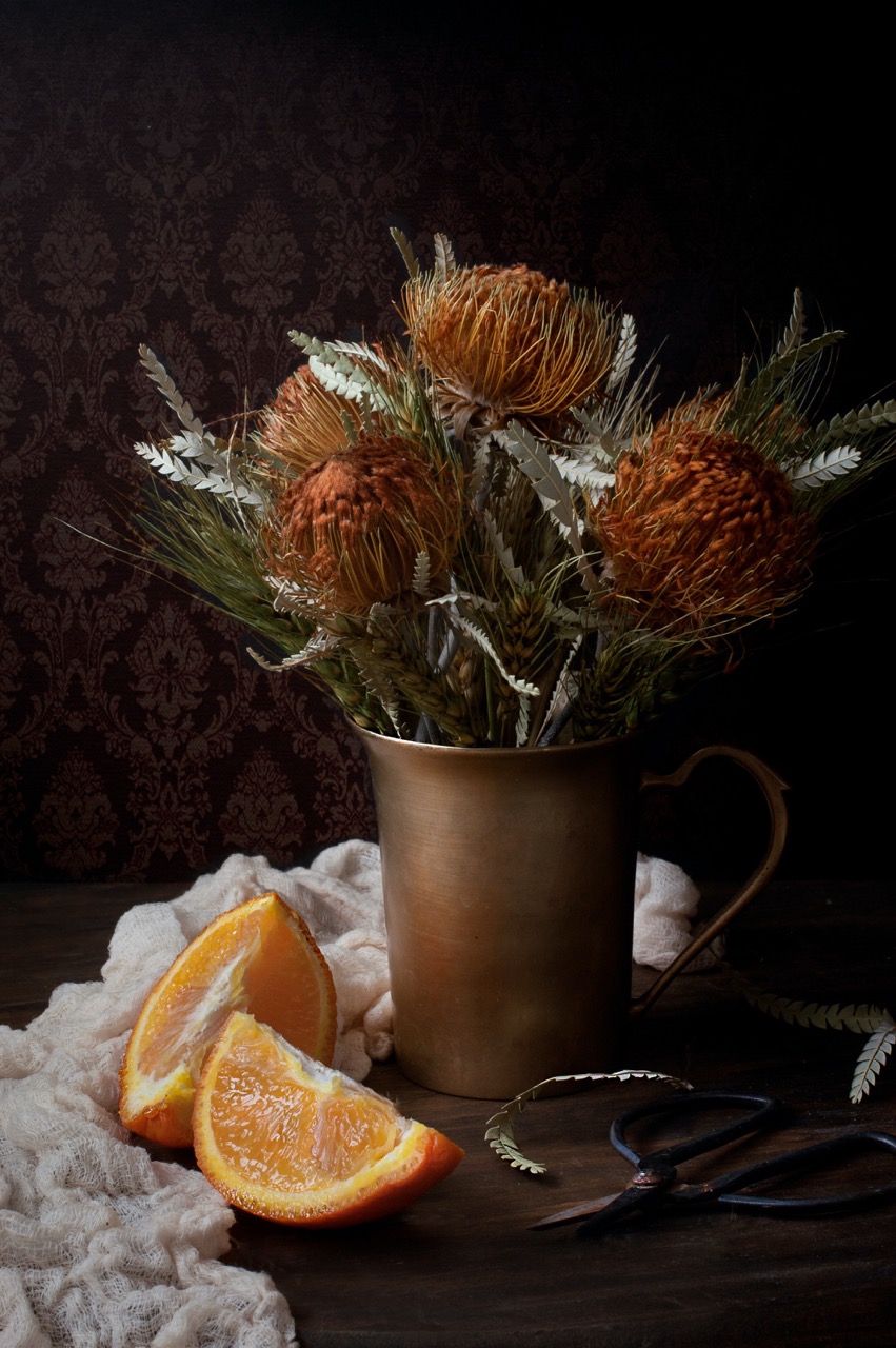 Still life drawing with orange and vase